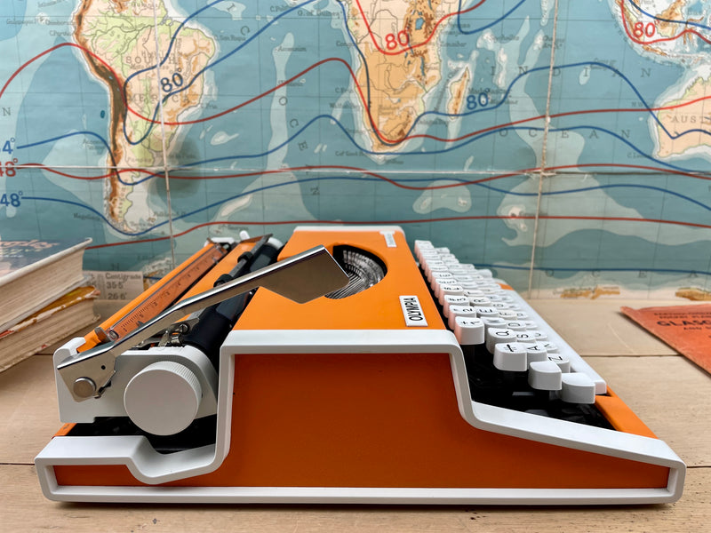 Typewriter, Orange Olympia Traveller de Luxe