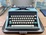 Typewriter, 1962 Blue Olympia SM7