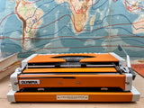 Typewriter, Orange Olympia Traveller de Luxe