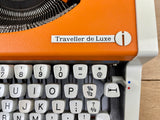 Typewriter, Orange Olympia Traveller de Luxe