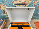 Typewriter, Orange Olympia Traveller de Luxe