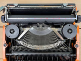 Typewriter, Orange Silver Reed 100